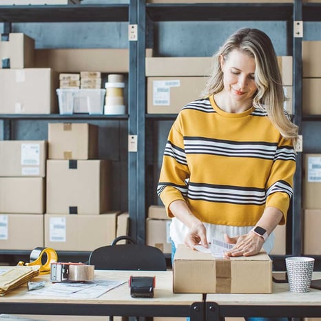 business-owner-packing-shipment