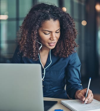 woman-listening-to-webinar